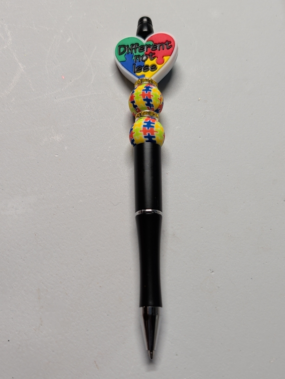 Hand Crafted Black Pen with Colorful Puzzle Heart Accent